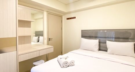 Bedroom 2 Serene Designed 2BR Apartment at Meikarta By Travelio