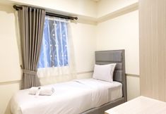 Bedroom 2 Serene Designed 2BR Apartment at Meikarta By Travelio