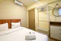 Kamar Tidur Modern 2BR Apartment at Meikarta By Travelio