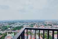 Lobi Minimalist 1BR Apartment at Tamansari Bintaro Mansion By Travelio