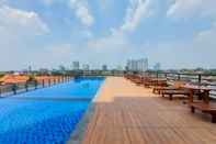 Swimming Pool Comfort and Cozy Living 1BR Tamansari Bintaro Mansion Apartment By Travelio