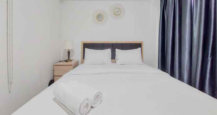 Bedroom Comfort and Cozy Living 1BR Tamansari Bintaro Mansion Apartment By Travelio