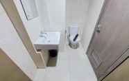 In-room Bathroom 4 Comfort and Cozy Living 1BR Tamansari Bintaro Mansion Apartment By Travelio