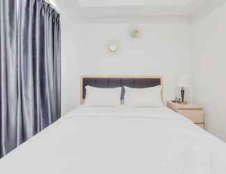 Bedroom 2 Homey and Comfort Living 1BR Tamansari Bintaro Mansion Apartment By Travelio