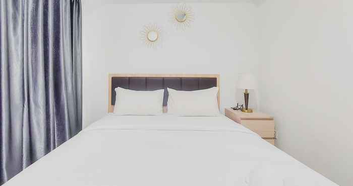 Bedroom Homey and Comfort Living 1BR Tamansari Bintaro Mansion Apartment By Travelio