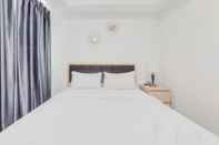 Bedroom Homey and Comfort Living 1BR Tamansari Bintaro Mansion Apartment By Travelio