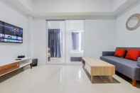 พื้นที่สาธารณะ Homey and Comfort Living 1BR Tamansari Bintaro Mansion Apartment By Travelio