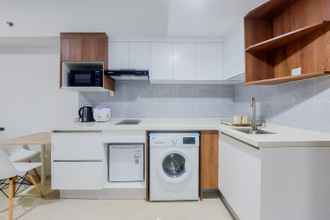 พื้นที่สาธารณะ 4 Homey and Comfort Living 1BR Tamansari Bintaro Mansion Apartment By Travelio