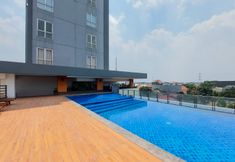 Swimming Pool 5 Well Furnished and Cozy 1BR at Tamansari Bintaro Mansion Apartment By Travelio