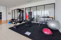 Fitness Center Well Furnished and Cozy 1BR at Tamansari Bintaro Mansion Apartment By Travelio