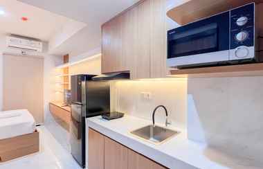 Sảnh chờ 2 Serene Studio Room Apartment at Delft Ciputra Makassar By Travelio