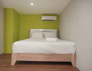 Kamar Tidur 2 Comfortable and Homey Studio at D'Loft Apartment By Travelio