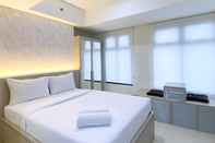 Bedroom Homey Studio Apartment at Pollux Chadstone By Travelio