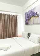 BEDROOM Comfortable 1BR Apartment at Vasanta Innopark By Travelio