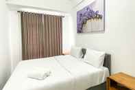 Bedroom Comfortable 1BR Apartment at Vasanta Innopark By Travelio