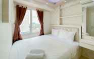 Kamar Tidur 4 Homey and Comfortable 2BR at Bassura City Apartment By Travelio