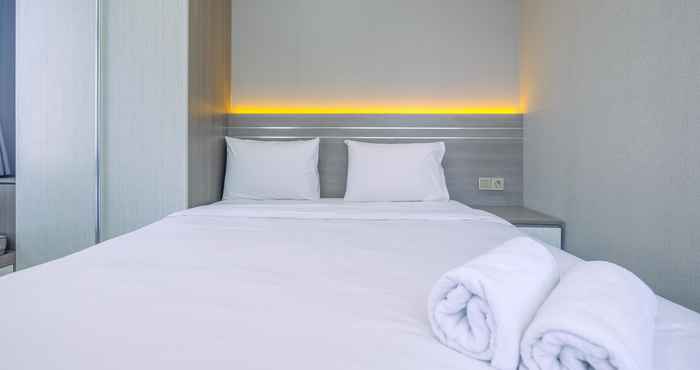 Kamar Tidur Homey and Restful 2BR at Transpark Cibubur Apartment By Travelio