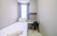 Bedroom 2 Homey and Restful 2BR at Transpark Cibubur Apartment By Travelio