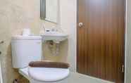 In-room Bathroom 5 Homey and Restful 2BR at Transpark Cibubur Apartment By Travelio