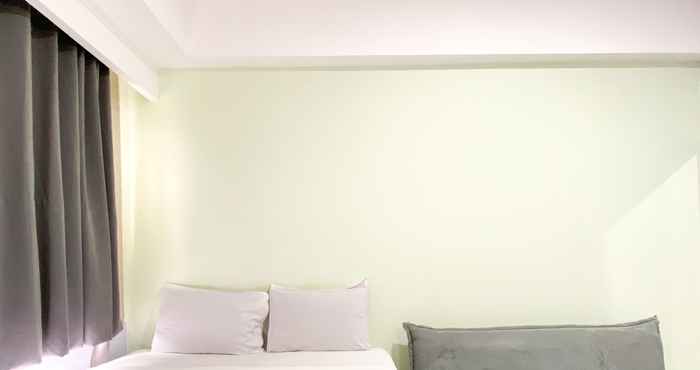 Bedroom Homey and Good Studio at Gateway Park LRT City Bekasi Apartment By Travelio