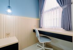 Bedroom 2 Simple Look Studio Apartment at Transpark Cibubur By Travelio