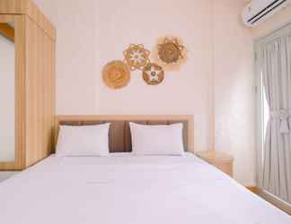 Bedroom 2 Homey 1BR without Living Room Apartment at Gunung Putri Square By Travelio
