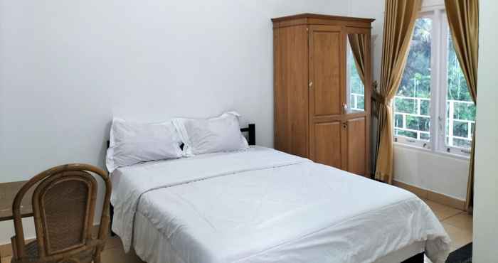 Kamar Tidur Wisma Silampari Mitra RedDoorz