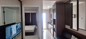 Lobi 3 Minimalism Designed 1BR at Parahyangan Residence Apartment By Travelio