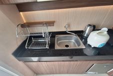 Common Space Minimalism Designed 1BR at Parahyangan Residence Apartment By Travelio