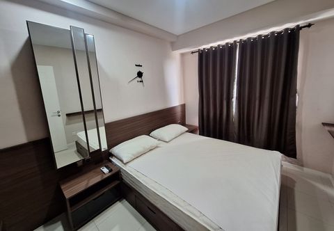 Kamar Tidur Minimalism Designed 1BR at Parahyangan Residence Apartment By Travelio