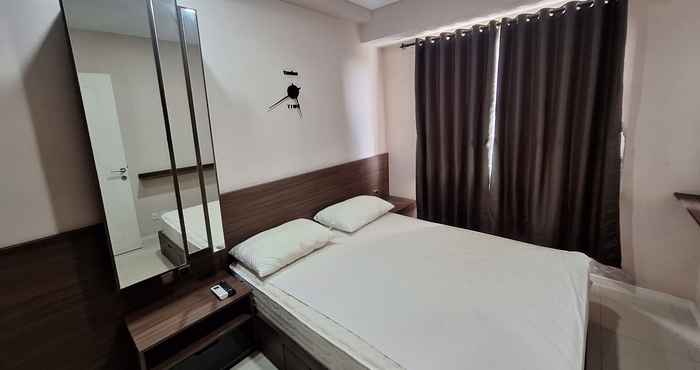 Bilik Tidur Minimalism Designed 1BR at Parahyangan Residence Apartment By Travelio