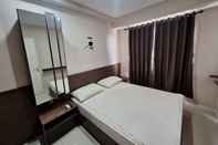 Bilik Tidur Minimalism Designed 1BR at Parahyangan Residence Apartment By Travelio