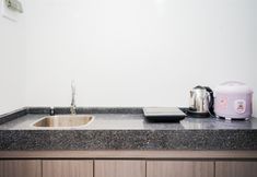 Common Space 2 Comfort Living Studio Carstensz Residence Apartment By Travelio