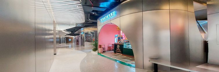 Lobby Comfort Living Studio Carstensz Residence Apartment By Travelio