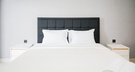 Bedroom 2 Comfort Living Studio Carstensz Residence Apartment By Travelio