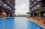 Swimming Pool 7 Comfort Living Studio Carstensz Residence Apartment By Travelio