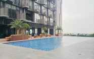 Swimming Pool 6 Comfort Living Studio Carstensz Residence Apartment By Travelio