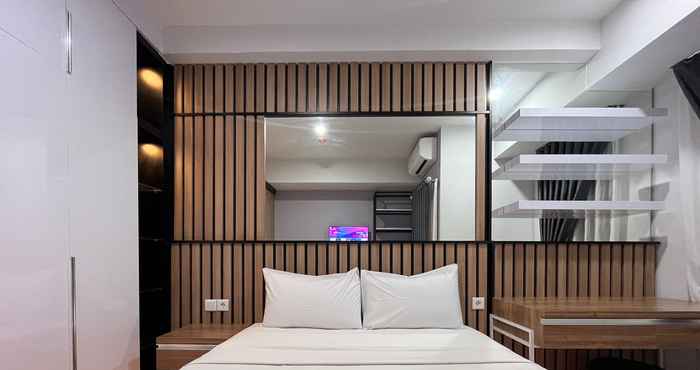 Bedroom Studio Room with Sea View Apartment at Delft Ciputra Makassar By Travelio
