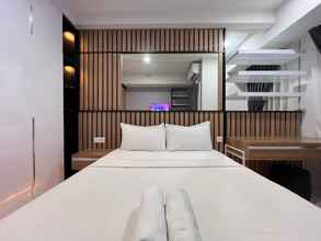 Bedroom Studio Room with Sea View Apartment at Delft Ciputra Makassar By Travelio