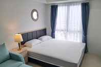 ห้องนอน Well Furnished Studio Apartment at Tamansari Bintaro Mansion By Travelio