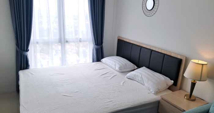 Kamar Tidur Cozy Living Studio Apartment at Tamansari Bintaro Mansion By Travelio