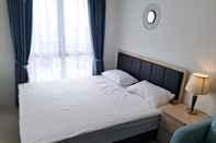 Bedroom Cozy Living Studio Apartment at Tamansari Bintaro Mansion By Travelio