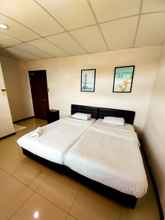 Bedroom 4 MB Budget Hotel