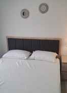 BEDROOM Enjoy Living and Comfort 1BR Tamansari Bintaro Mansion Apartment By Travelio