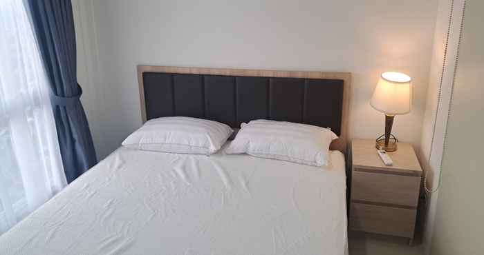 Phòng ngủ Enjoy Living and Comfort 1BR Tamansari Bintaro Mansion Apartment By Travelio