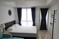 Bedroom Homey and Elegant Studio Tamansari Bintaro Mansion Apartment By Travelio