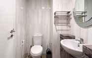 In-room Bathroom 4 Cozy and Best Deal 1BR Tamansari Skylounge Makassar Apartment By Travelio
