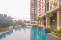 Kolam Renang Homey and Good Deal 2BR Transpark Cibubur Apartment By Travelio