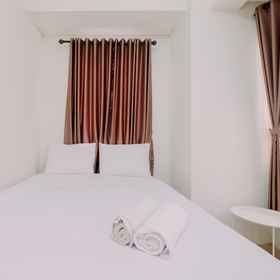 Bedroom 1 Homey and Good Deal 2BR Transpark Cibubur Apartment By Travelio, Spring Garden Residence 酒店