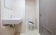 In-room Bathroom 2 Comfy and Restful 1BR Tamansari Bintaro Mansion Apartment By Travelio